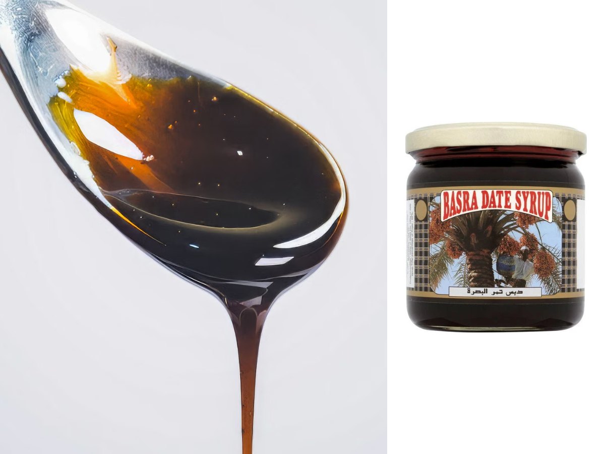 A spoon dripping thick, dark syrup, with a jar of Basra Date Syrup
