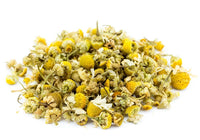 Pile of dried chamomile flowers