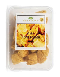 Madina halal honeycomb toffee in a clear tub