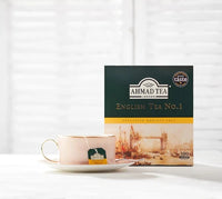 Ahmad Tea English Tea No.1 box beside a cup of tea