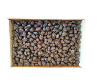 Top view of Madina Ajwa dates packed in a box