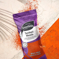 Greenfields tandoori masala pack with scattered red spice