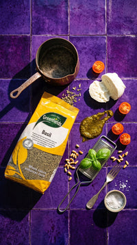 Greenfields dried basil pack with pesto and cheese on purple tiles