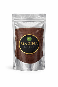 Madina date seed powder in a silver stand-up pouch