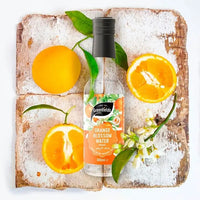 Greenfields orange blossom water bottle with oranges and orange blossom