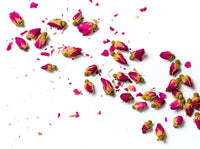 Scattered dried pink rose buds