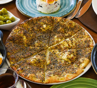 Za'atar manakish flatbread cut into slices