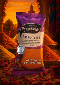 Greenfields ras el hanout pack with spice mounds on a Moroccan market backdrop