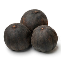 Three whole dried black limes (loomi)
