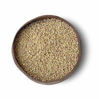 Bowl of pearl barley grains